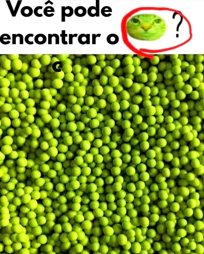 Desafio visual para encontrar um gato verde escondido entre várias ervilhas.